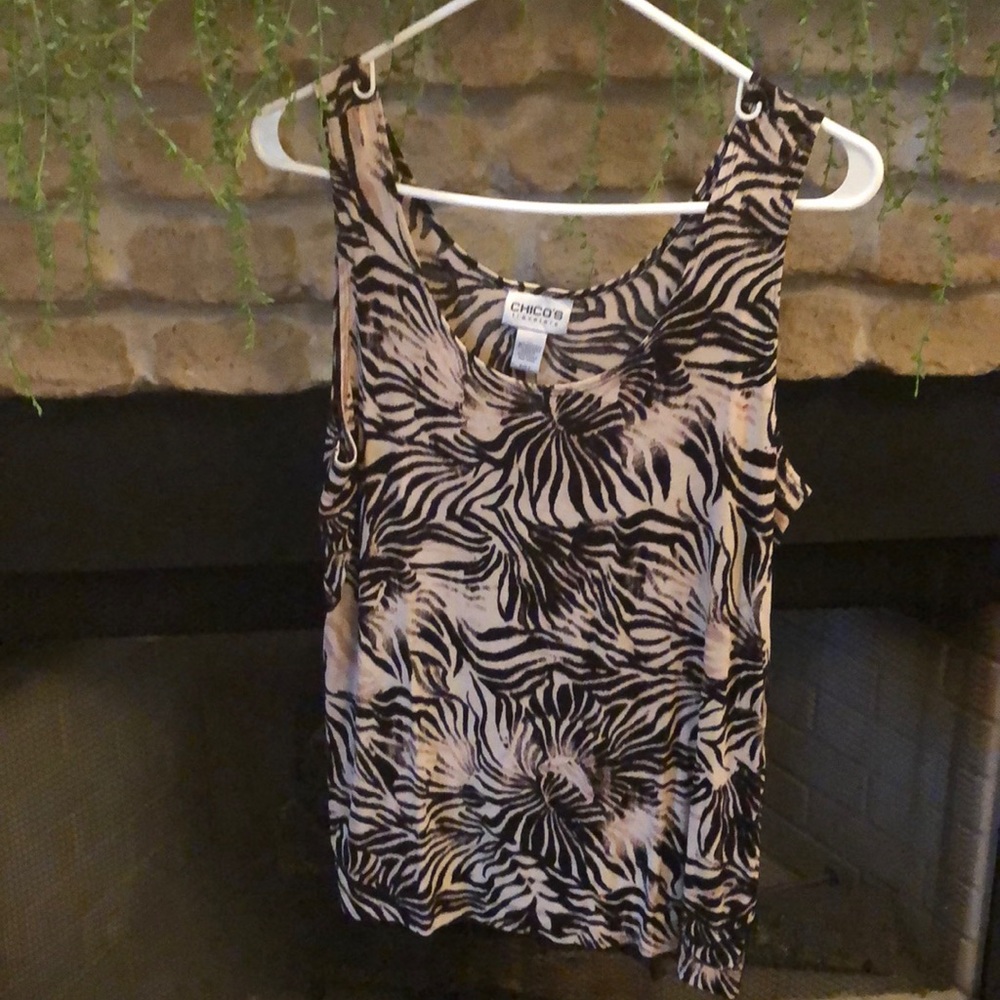Top black and beige with print.